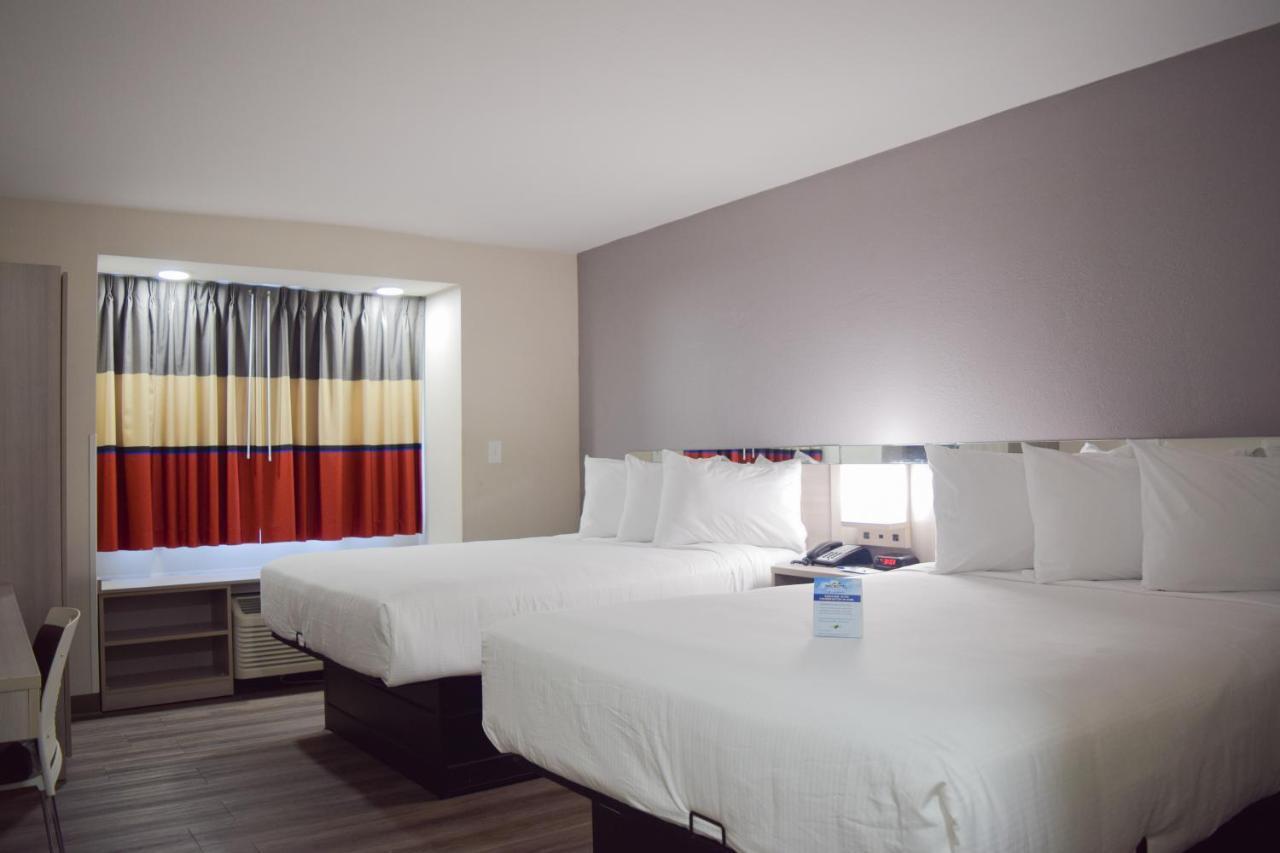 Travelers Inn And Suites Ралі Екстер'єр фото
